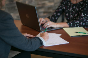 photo of people at desk
